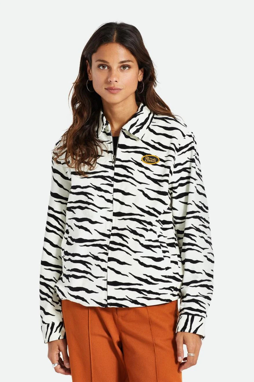 Model Photo of Brixton Women's Utopia Jacket in off white featuring a tiger stripe pattern with a collar, zip closure, and pockets.