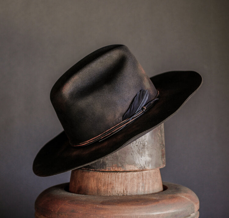 Angled View of Recapitate Hat - Black Goose