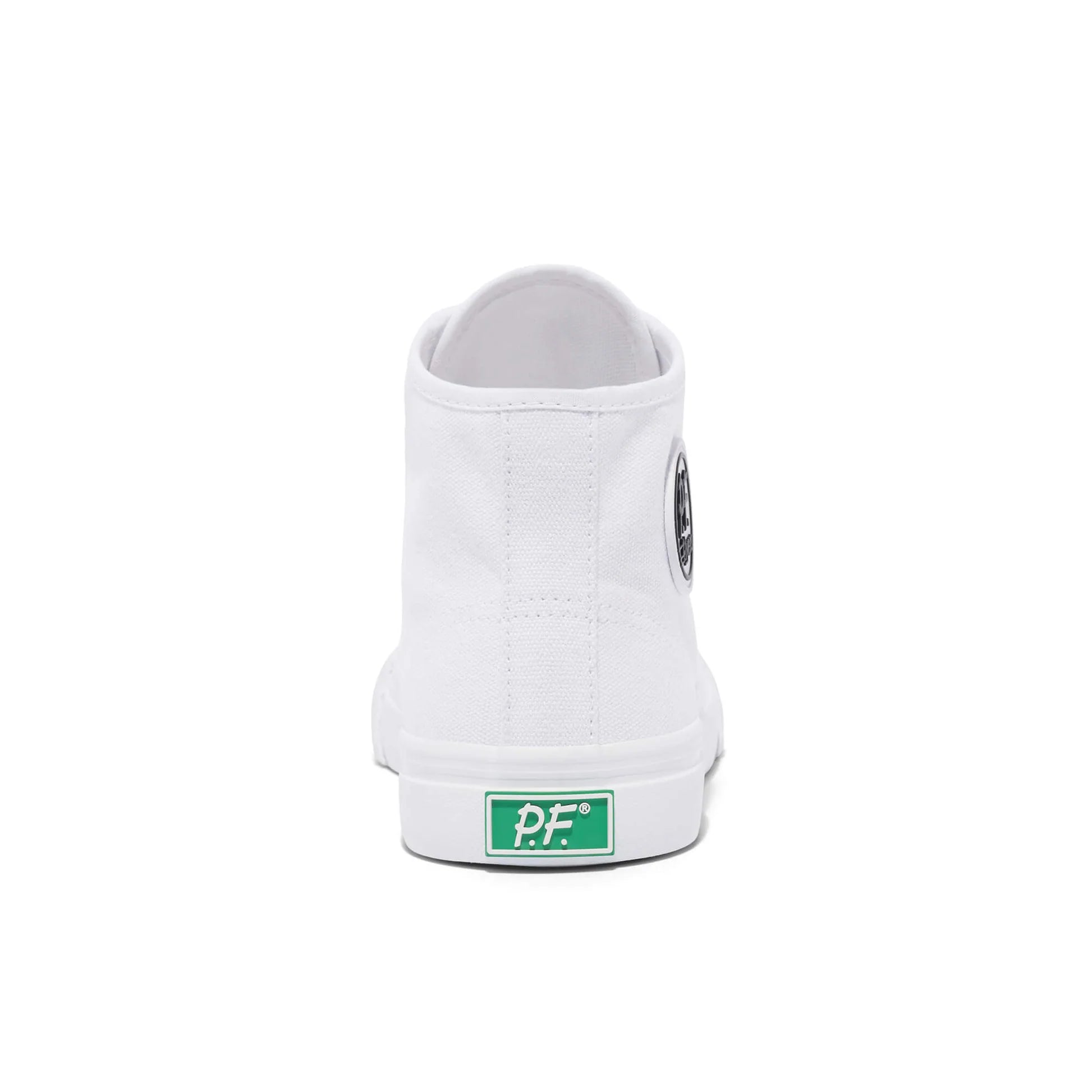 White high-top sneaker with a green label on a white background