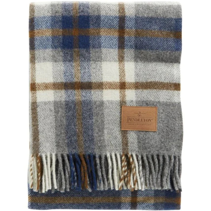 A Pendleton Motor Robe with a plaid pattern, featuring a combination of blue, beige, and gray colors, displayed with the brand label visible.