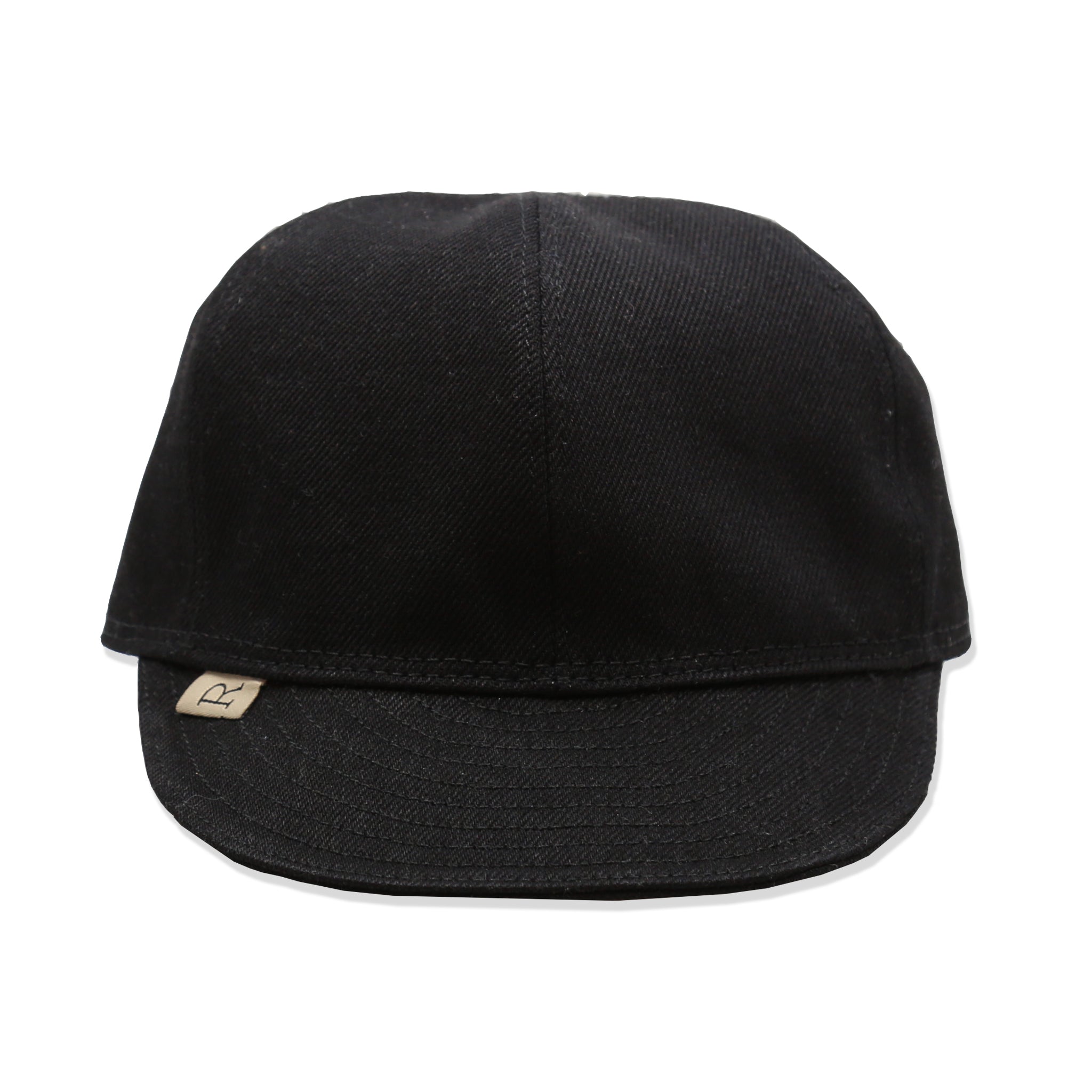A black denim mechanic hat with a Railcar 'R tab" brand label sewn on the brim.