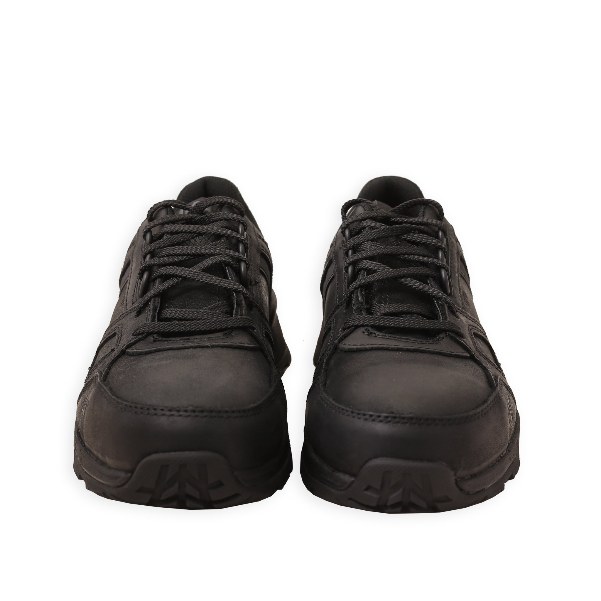 Front of A pair of black CAT women's work sneakers with a steel toe and a rubber outsole.