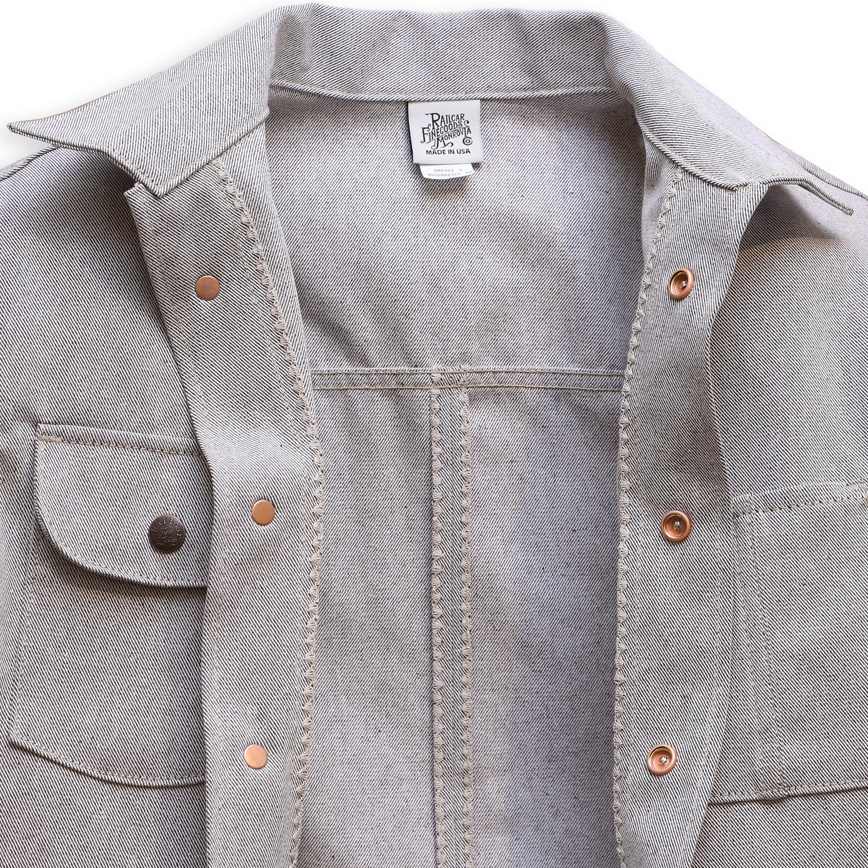 Interior of A gray Chore Coat with oatmeal denim fabric showing shelling detail.