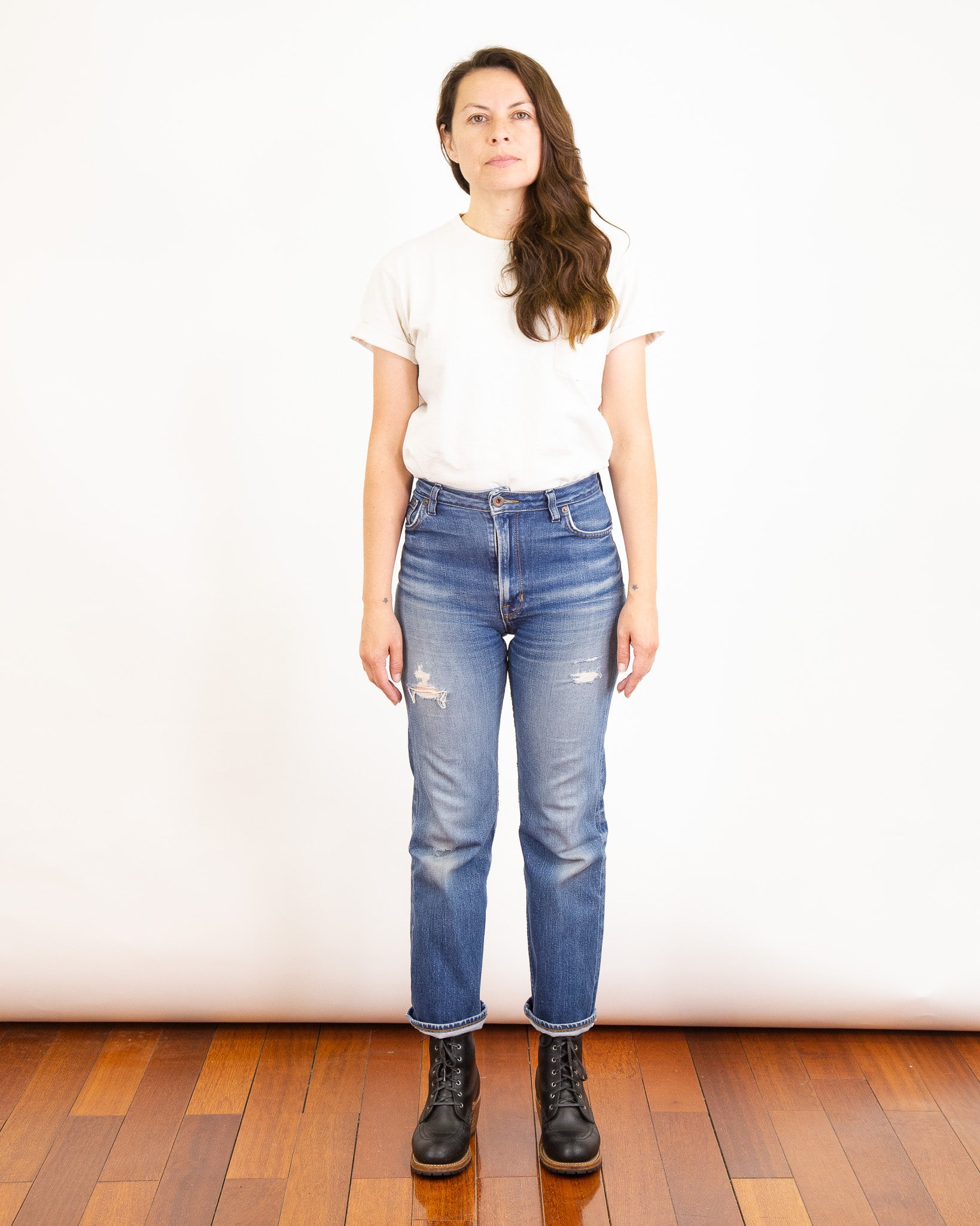 Model Photo of Front of Drifter X061 Pure Indigo Jeans with one year of wear and many consistent washes.