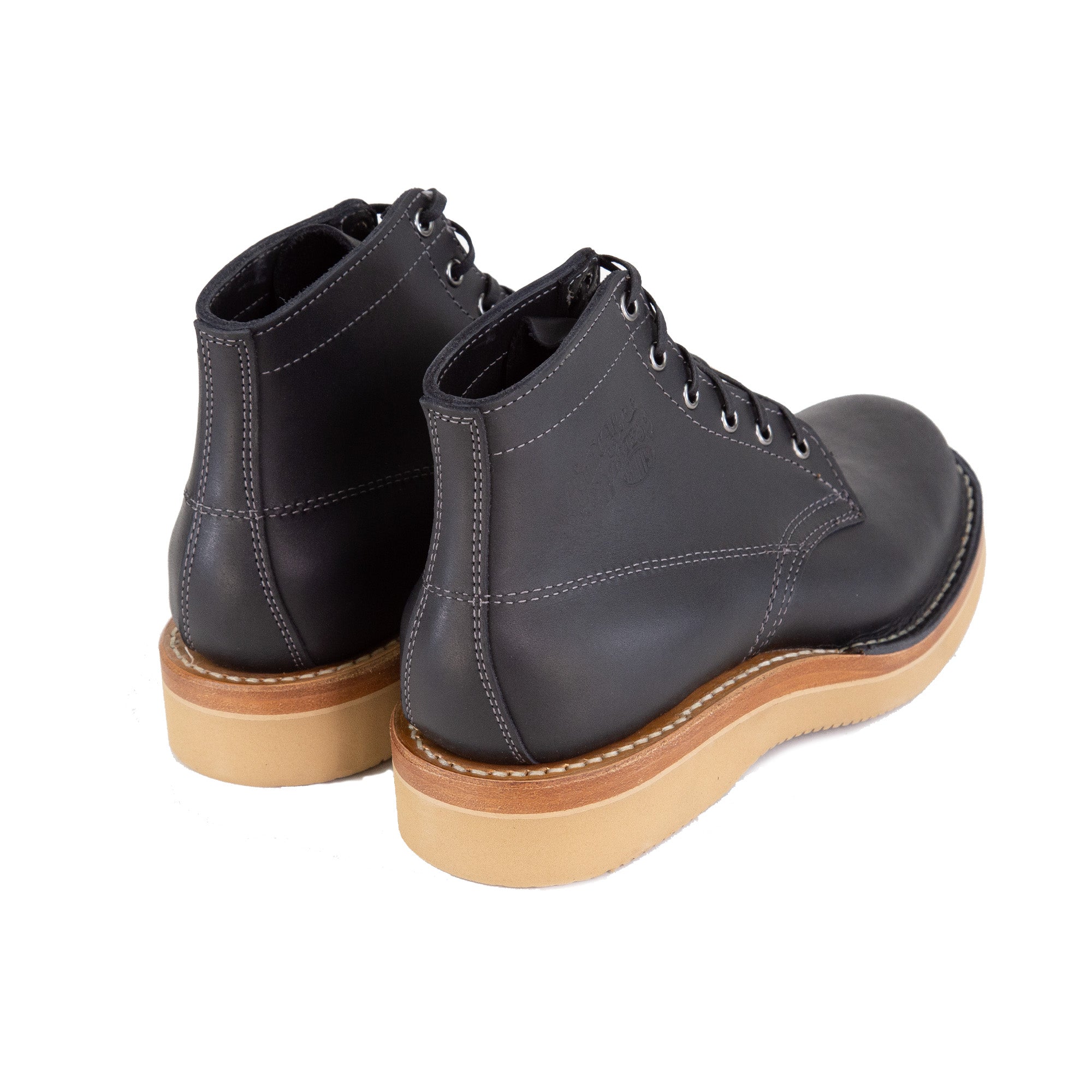 Back Angle of Railcar X Whites 55 Collaboration Boots